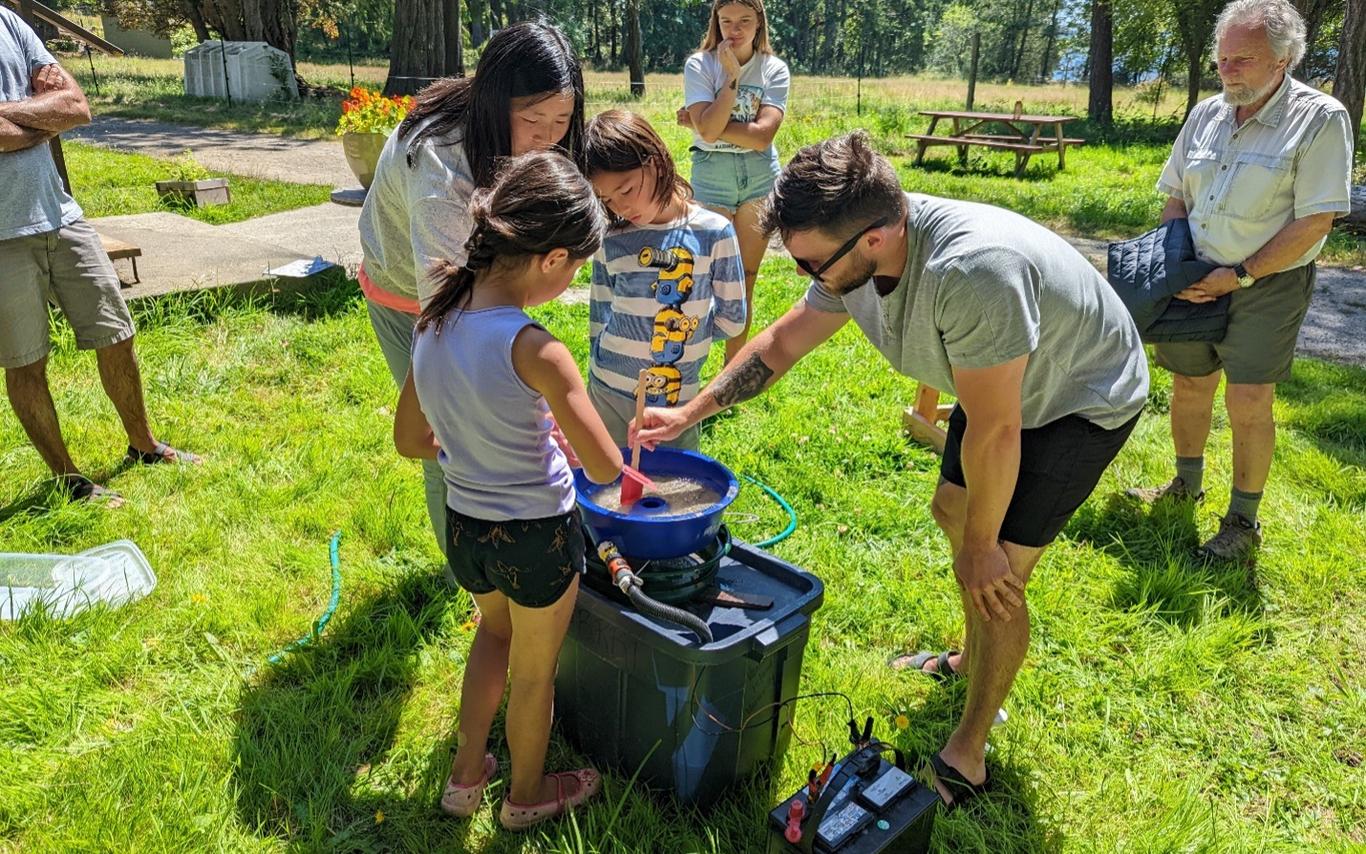 Forage Fish volunteers learning how to process samples