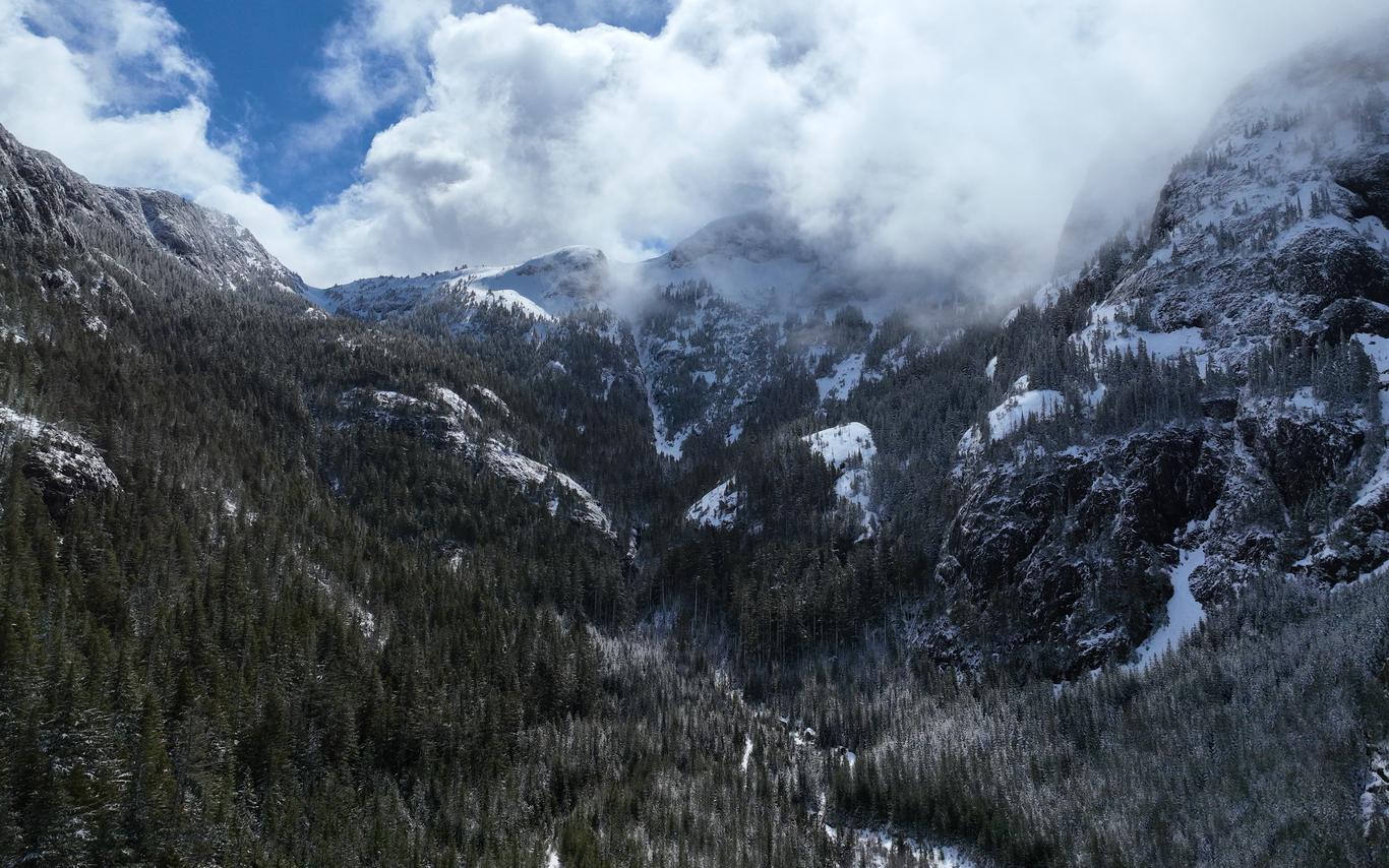 Arial shot of Mount Arrowsmith in the clouds